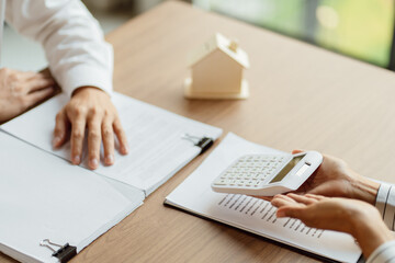 Business people signing contract making deal with real estate agent Concept for consultant home insurance.Real estate investment Property insurance security. Real estate agent offer house.