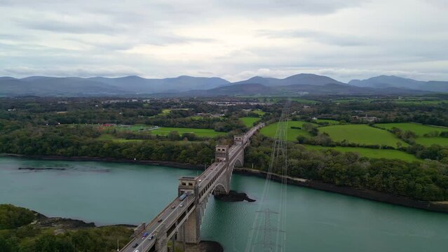 Aerial View Of Britannia Bridge carries road and railway across the Menai Straits between, Snowdonia and Anglesey. Wales, United Kingdom Aerial 