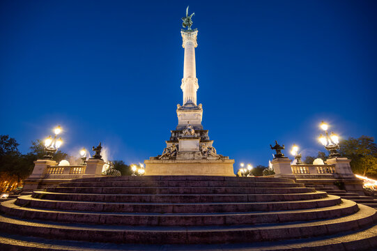 Place des Quinconces and Girondins fountain monument at night, Bordeaux, Aquitaine, France. High quality photo