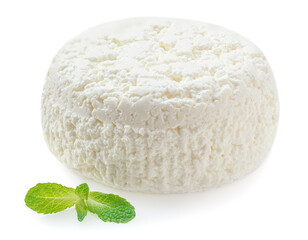 Cottage cheese isolated on white background closeup. Fresh grainy cottage cheese or feta with mint leaf close up