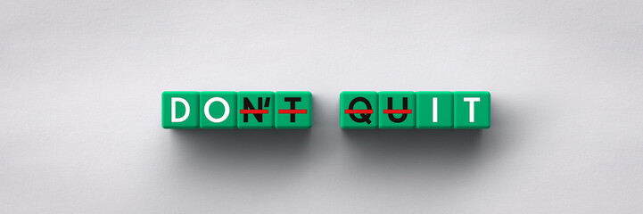 3D Cubes with the words don't quit strikethrough and do it