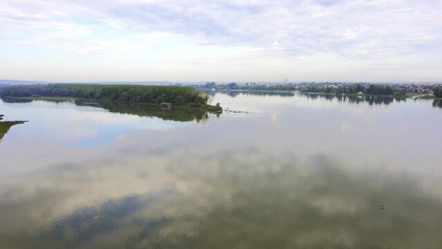 Drone footage of river Danube and wooded river island on it