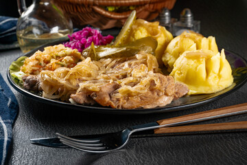 Pork tenderloin stewed in onions.