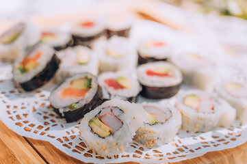 Closeup of Assorted Sushi at a Picnic Outdoors
