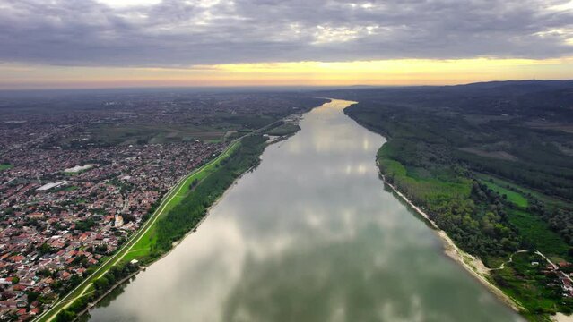 Sunset above river Danube and town Beocin on a riverbank in Serbia