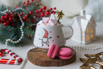 A cup of hot, aromatic cocoa with marshmallows, a calendar for 2024, a New Year's mood.