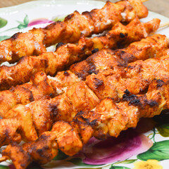 Dining table and chicken shish kebab in a luxury restaurant, delicious tavuk sis kebab