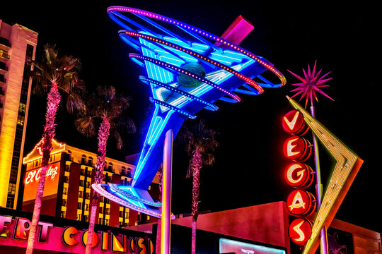 A martini glass and Vegas sign on Fremont Street at night