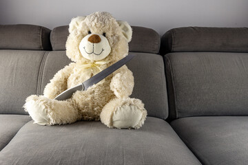 Sad bear mascot domestic violence against children child abuse