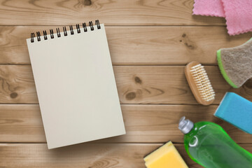 Spiral notepad with space for text on cleaning products background. Shopping list, household chores...