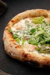 Pizza with shrimp, mozzarella cheese, green salad leaves
