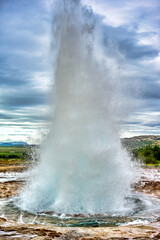 Strokkur is a fountain-type geyser located in a geothermal area beside the Hvítá River in Iceland in the southwest part of the country, east of Reykjavík.