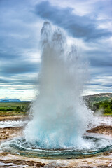 Strokkur is a fountain-type geyser located in a geothermal area beside the Hvítá River in Iceland...