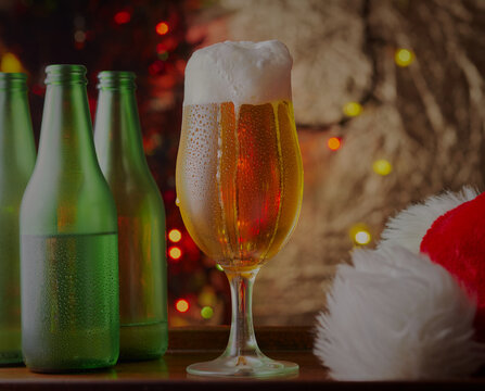 Christmas drinks with a santa hat and decorations in the background.
