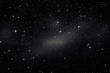 A captivating black and white photo capturing the beauty of a galaxy filled with stars. Perfect for celestial-themed designs and astronomical concepts