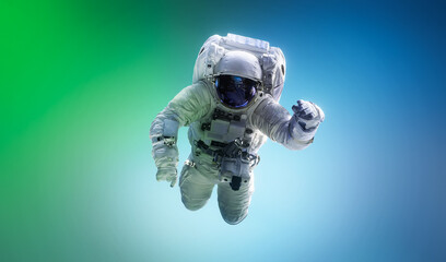 Spaceman floating in space. Astronaut on bright blue and green background. Man in space suit fly....