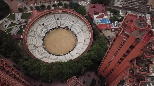 Aerial drone shot of Bogota downtown with Santamaria Bullring or Plaza de Toros de Santamaria, Colombia, Latin America. High quality 4k footage.