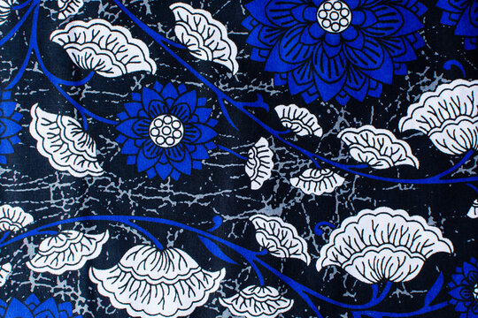Overhead view white and blue floral ankara fabric