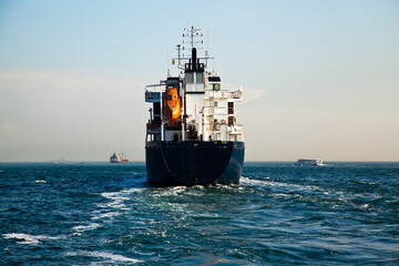 Large cargo ship engaged in international logistics transportation and passing through the Istanbul Bosphorus