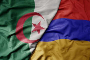 big waving national colorful flag of armenia and national flag of algeria .