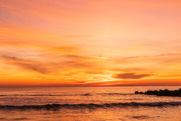 Naklejka na ściany i meble Ocean waves at Sunrise at Avon by the Sea New Jersey on the New Jersey Shore