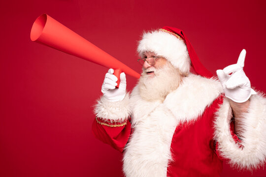 Real Santa Claus with red megaphone