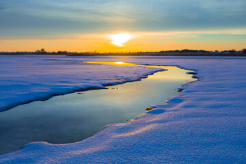 snowbound prairie at the dramatic sunset