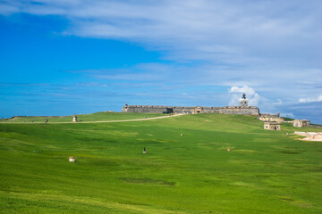 Fototapeta na wymiar Background of beautiful meadow in Old San Juan, Puerto Rico. This area in front of Castillo San Felipe Del Morro or El Morro is set for public. A significant political, iconic, historic location
