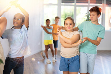 In fitness club, boy became couple with girl and trains dance to rhythm of Latin music. Classes for...