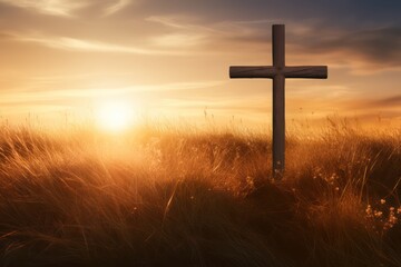 Silhouette christian cross on grass in sunrise background 