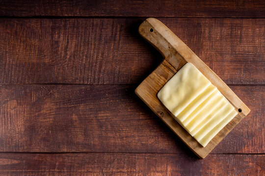 Cheese slices. Portion of sliced mozzarella cheese.