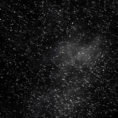 Stars of a planet and galaxy in a free space. Snow on a dark background