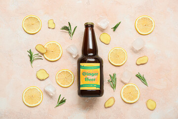 Composition with bottle of fresh ginger beer, rosemary, lemon slices and ice cubes on light...