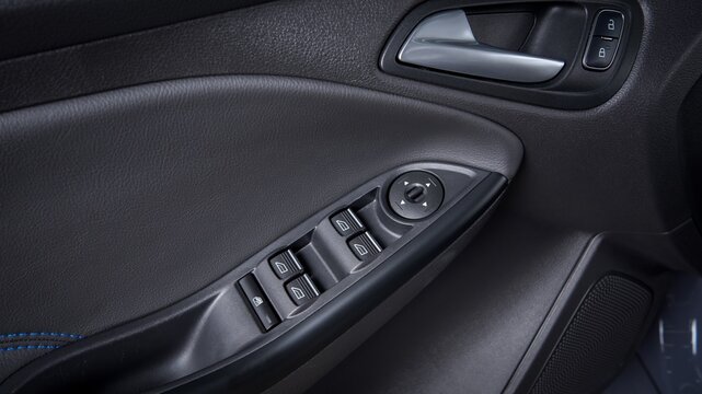 Drivers door arm rest and window controls