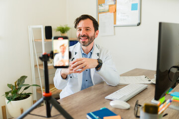 Attractive latin doctor streaming a medical video