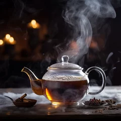 Fototapeten A cup of tea with a steam coming out of it. Teapot with a cup of tea,Steaming Elegance A Cup of Earl Grey Tea on a winter Afternoon © medienvirus