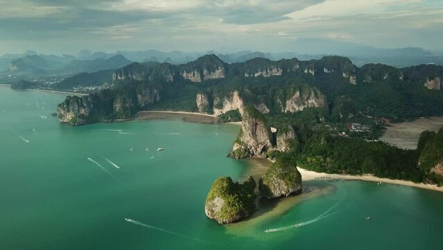 Aerial view of tropical turquoise lagoon, beach between rocks and islands, Krabi, Railay, Thailand, 4k