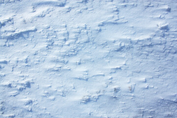 the texture of winter snow with lumps