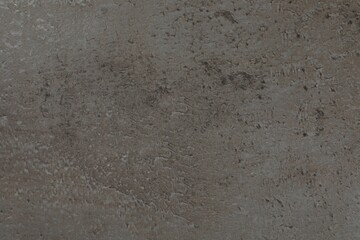 Grey stone surface as background, closeup view