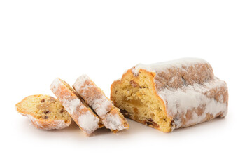 Tasty Christmas stollen on white background