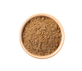 Bowl of aromatic caraway (Persian cumin) powder isolated on white, top view