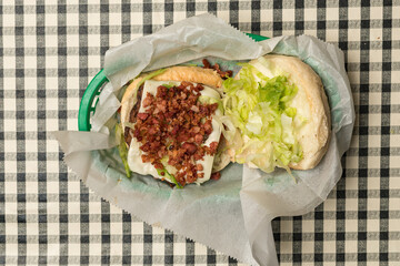 Bacon cheeseburger in a basket