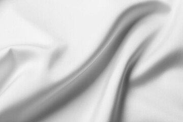 Fototapeta premium Texture of white silk ripple fabric as background, closeup