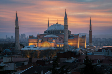 View of the Hagia Sophia Grand Mosque from the roof of the house against the background of the dawn...