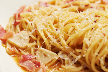 spaghetti with oil sauce and parmesan