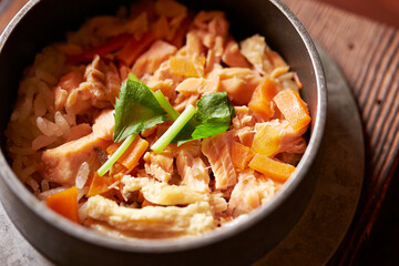 Stone pot rice with fish and vegetables