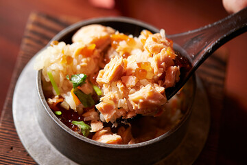 Stone pot rice with fish and vegetables	