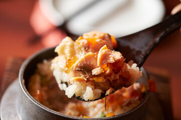 Stone pot rice with fish and vegetables	