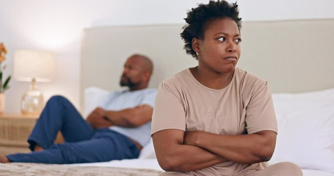 Frustrated black couple, conflict and divorce on bed in argument, disagreement or fight at home. African woman ignore man in bedroom dispute, cheating affair or breakup in toxic relationship at house