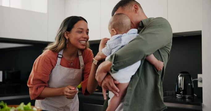 Baby, smile and a family cooking in the kitchen of their home together for health, diet or nutrition. Food, happy or pacifier with a mama, papa and infant child using ingredients for supper or a meal